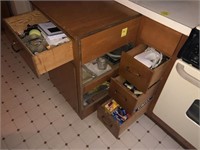 CONTENTS OF CABINETS LEFT OF STOVE