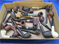 lot of old smoking pipes