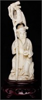 Antique Carved Ivory Fisherman Figurine