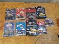 (9) Diecast Race Cars in Packages