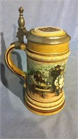 Antique German Mettlach beer stein with pottery