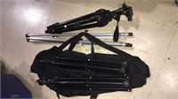 Four tripods including two that look like they’re