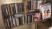 Two boxes of CDs and seven DVDs, (793)