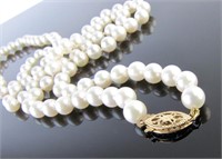 24" Strand of Cultured Pearls, 14K Clasp