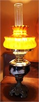 MAJOLICA OIL LAMP WITH METAL BASE AND SLIP GLASS