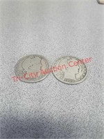 Two 1909 silver Barber half dollar coins currency