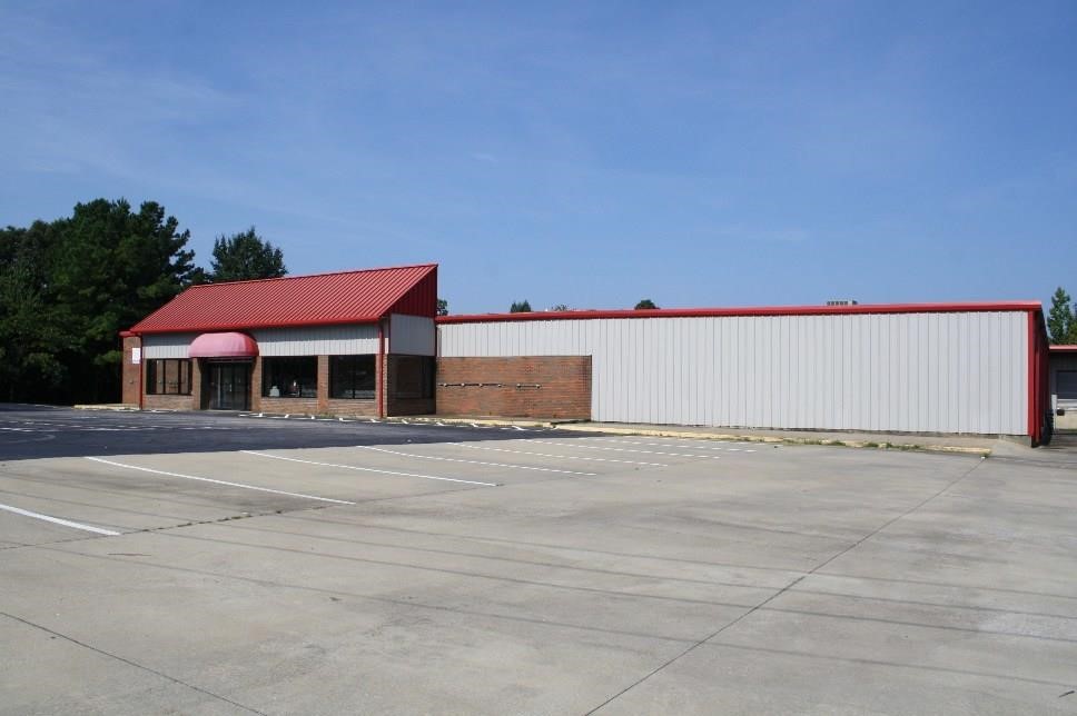 Lender Ordered Auction of Retail Building with Fuel Pumps