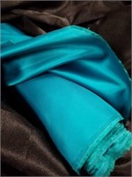 Roll of Teal Satin Material