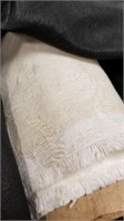 Roll of Oyster colored Poly rayon Material