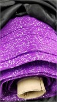 Roll of Purple mesh Material w/glitter splatter