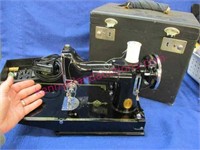 old "singer featherweight" sewing machine in case