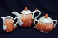 German Figural teapot, creamer and sugar
