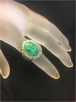 Sarah Coventry "flip" ring- green stone flips toe
