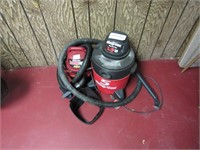 Two small shop vacuums