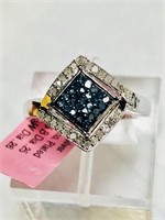 $450. S/Silver Blue and White Diamond Ring