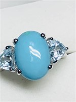 $200. S/Silver Turquoise and Blue Topaz Ring