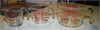 2 Pyrex Measuring Cups and 1 Anchor Measuring Cup