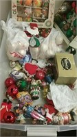 Under bed tub filled with holiday ornaments