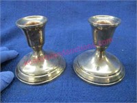 pair of sterling weighted candle holders