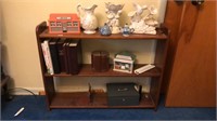 Small bookshelf with contents