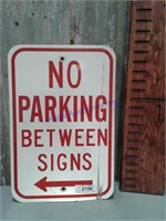 No Parking Between Signs road sign