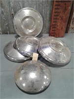 Set of 4 matching hubcaps, 1 baby moon