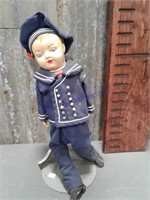 Sailor doll on stand