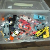 Toy cars in small tote