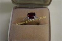 LADIES STERLING SILVER AND RED RUBY RING