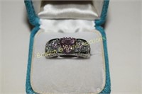 LADIES STERLNG SILVER AND PINK SAPPHIRE RING.