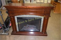 USED 57" X 46" TALL ELECTRIC FIREPLACE/HEATER IN