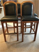 4 Bar Maple barstools with green leather seats