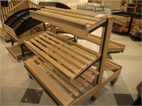 2-sided wooden display unit on casters