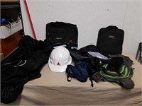 Nike duffel bag, Schwinn backpack, hard hat with