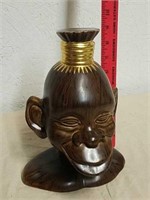 Decorative ceramic monkey head statue