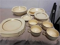 Group of vintage plates and cups with golden rim