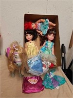 Three Disney princess dolls with horse and