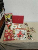 Group of Christmas ornaments, gift wrap and more