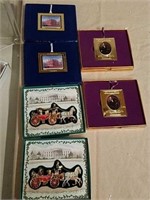 Group of collectible ornaments in boxes