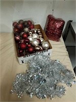 Group of red and silver ornaments and Garland