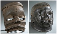 2 African masks. 20th century.