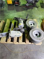 Electric cart axles wheels and tires.   Has drive