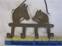 Brass horse head key rack
