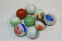 Lot of 9 vintage shooter marbles