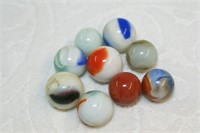 Lot of 9 vintage shooter marbles