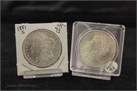 (2) Morgan Silver Dollars:
