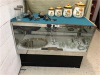 Glass showcase with contents