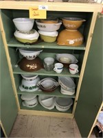 Vintage cabinet full of Pyrex