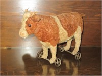 Straw Filled Cow Pull Toy (early)