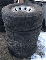 Lot of Four Truck Tires with rims